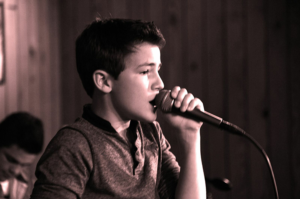 Alex B. Singing Live